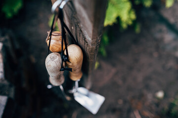 gerdening tools hanging on hook