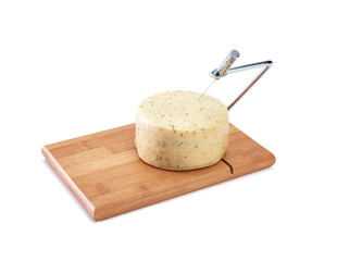 Cheese on wooden cheese cutter