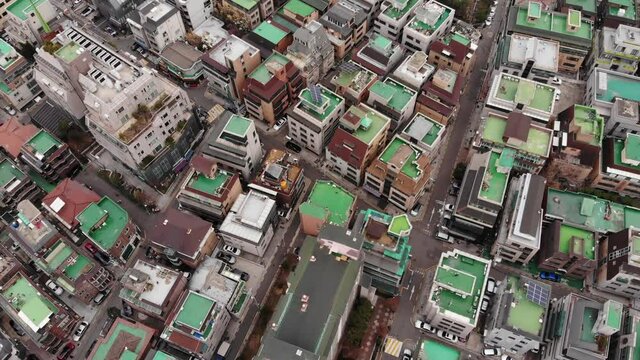 Aerial view of residential area at Samseong-dong, roofs of family houses, compact low-rise buildings at central district of Seoul. Expensive housing estate of Gangnam
