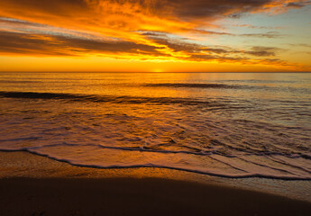 A beautiful sunrise from the shore of the beach