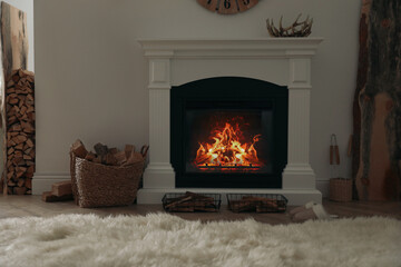 Firewood burning bright in elegant hearth indoors