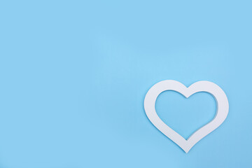 white heart on a blue background with room for text