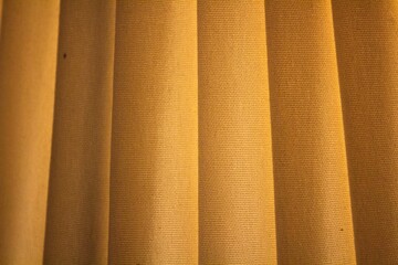 evocative image of texture of verical striped canvas
