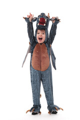 Cute baby boy in dragon costume.