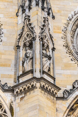 Obraz premium Architectural fragments of Gothic style Roman Catholic Cathedral of Sainte-Croix dominates in Orleans city Centre. Construction of Sainte-Croix started in 1287, inaugurated in 1829. Orleans, France.