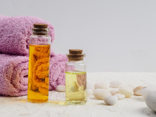 Spa accessories with stones, Composition of spa treatment on table colorful background