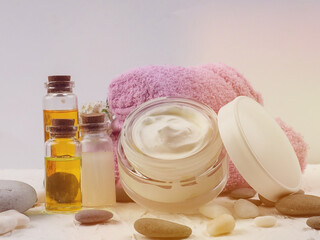 Spa accessories with stones, Composition of spa treatment on table colorful background