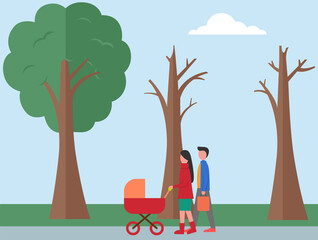 Young parents pushing stroller in autumn park. Man and woman are walking with child in street. Family on walk. Mom is looking at baby in stroller. Husband and wife spend time together outdoors