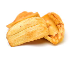 Close up of a pile of dried jackfruit chips isolated on white background