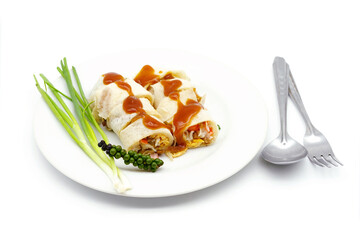Vietnamese spring rolls with shrimp, soy sauce and fresh pepper and Spring onion with the inscriptionYUMMY. Close-up.