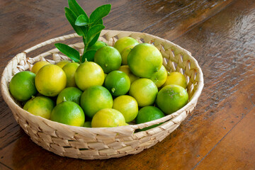 Galician lemon basket on wooden table