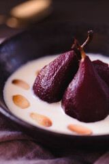 Poached pears in red wine and creme anglaise