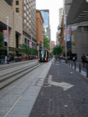 Naklejka na ściany i meble Tram moving through George St in Sydney NSW Australia
