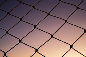 Dawn seen from a window with a protection screen