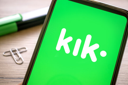 kik logo on the green screen of a smartphone. Messaging app on your phone. Italy, Verona, 17-02-21