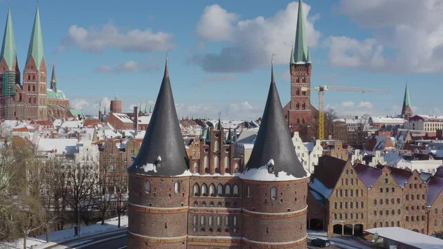 Aerial view of the Holsten Gate in L&uuml;beck after snowing