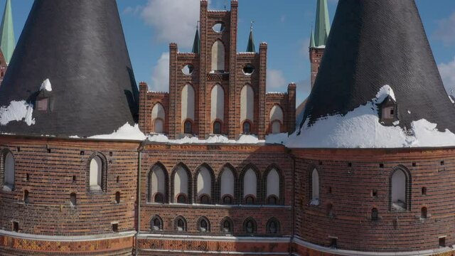 Aerial view of the Holsten Gate in L&uuml;beck after snowing