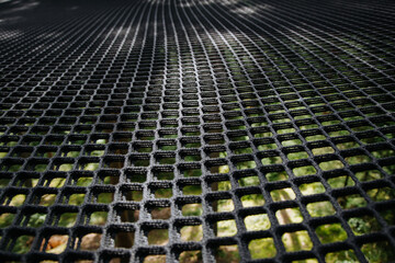 Fototapeta premium Wire grid fence pattern, perspective view. Concept of safety.