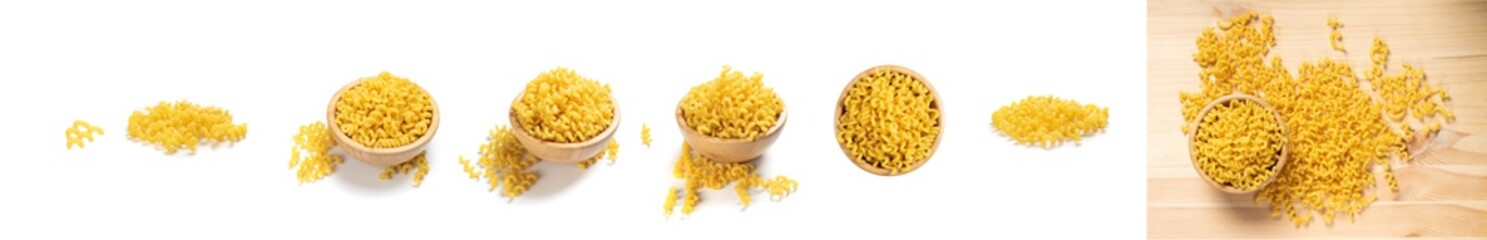 Raw yellow cavatappi pasta isolated on white background