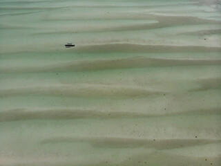 Aerial Shot of Low Tide Sea Bottom Sand Waves Pattern. Long Shallow Indian Ocean Shoal