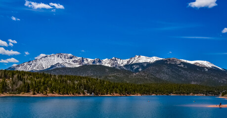 Panorama Snow-capped and forested mountains near a mountain lake, Pikes Peak Mountains in Colorado...