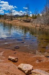 Crystal Creek reservoir near snow-capped mountains Pikes Peak Mountains in Colorado Spring, US