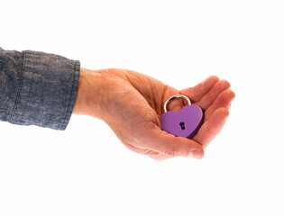 Fototapeta premium hands holding a heart padlock