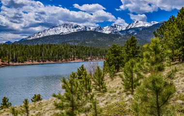 Fototapeta na wymiar Crystal Creek reservoir near snow-capped mountains Pikes Peak Mountains in Colorado Spring, US