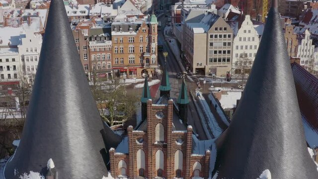 Aerial view of the Holsten Gate in L&uuml;beck after snowing