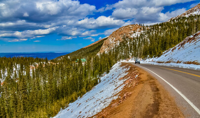The road to the snow-covered mountain Pikes Peak, Colorado, US