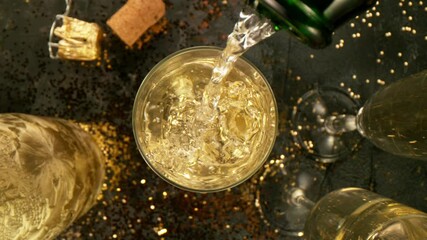 Super slow motion of pouring champagne into glass with camera motion. Filmed on high speed cinema camera, 1000 fps. - Powered by Adobe