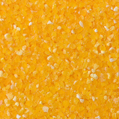 raw crushed corn groats close up