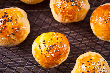 Fresh homemade whole grain burger buns with sesame