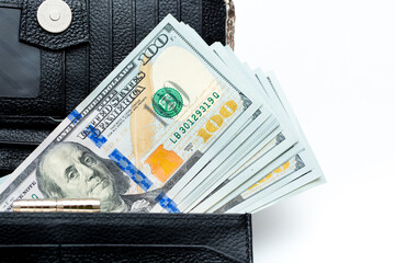 Purse with money. Financial well-being. Cash in female wallet isolated on white background. Good cash income, wages. Solvent person.