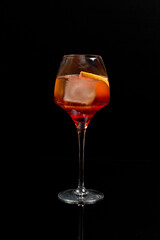 aperol spritz wine cocktail prosecco on black background.