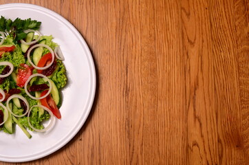 Salad baked eggplant and fresh tomatoes. Top view