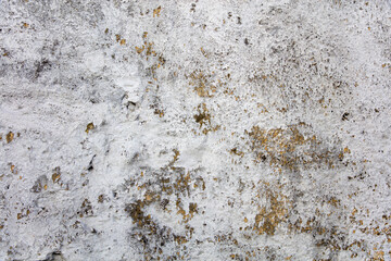 Old concrete wall with paint peeling off