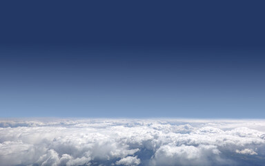 Beautiful sky landscape with view from the plane above dense white clouds high in the stratosphere on a sunny day horizontal photo - obrazy, fototapety, plakaty
