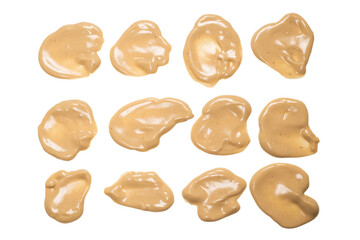 Mushroom sauce splashes isolated on white background.