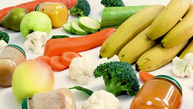 baby puree with vegetables and fruits. selective focus.