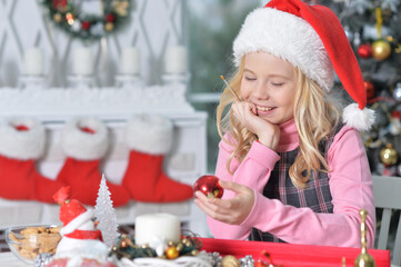 Portrait of happy girl  preparing for Christmas