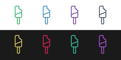 Set line Ice cream on stick icon isolated on black and white background. Sweet symbol. Vector.