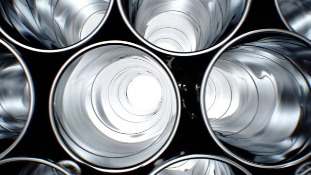 Rows of Metal Pipes with Reflections and Sun Light Inside. Looped 3d Animation. Steel Pipes at Metal Factory. 4k Ultra HD 3840x2160.