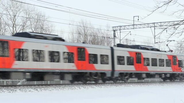 St. Petersburg, Russia, January 19, 2020  electric train swallow is passing by in winter