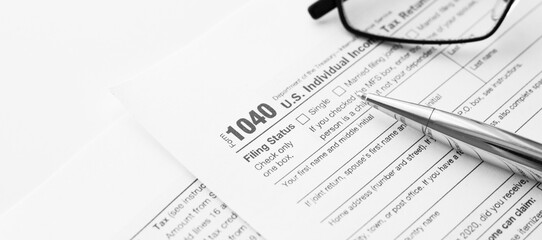 United States American IRS Internal Revenue Service income tax filing form 1040 for revenue...