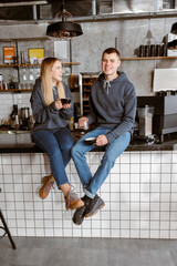 Fototapeta na wymiar Happy smiling professional barista in cafe
