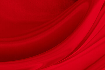 Black red satin dark fabric texture luxurious shiny that is abstract silk cloth background with patterns soft waves blur beautiful.