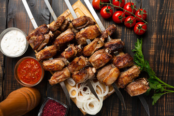barbecue lamb ribs on cutting board on wooden table