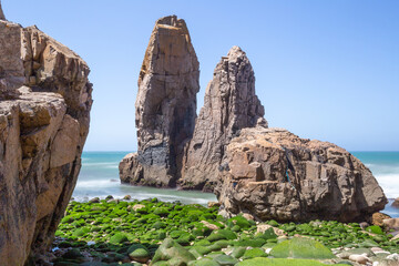 Landscape over the remote louriçal beach access is by a rope