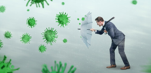 Businessman opposing a conceptual storm of viruses